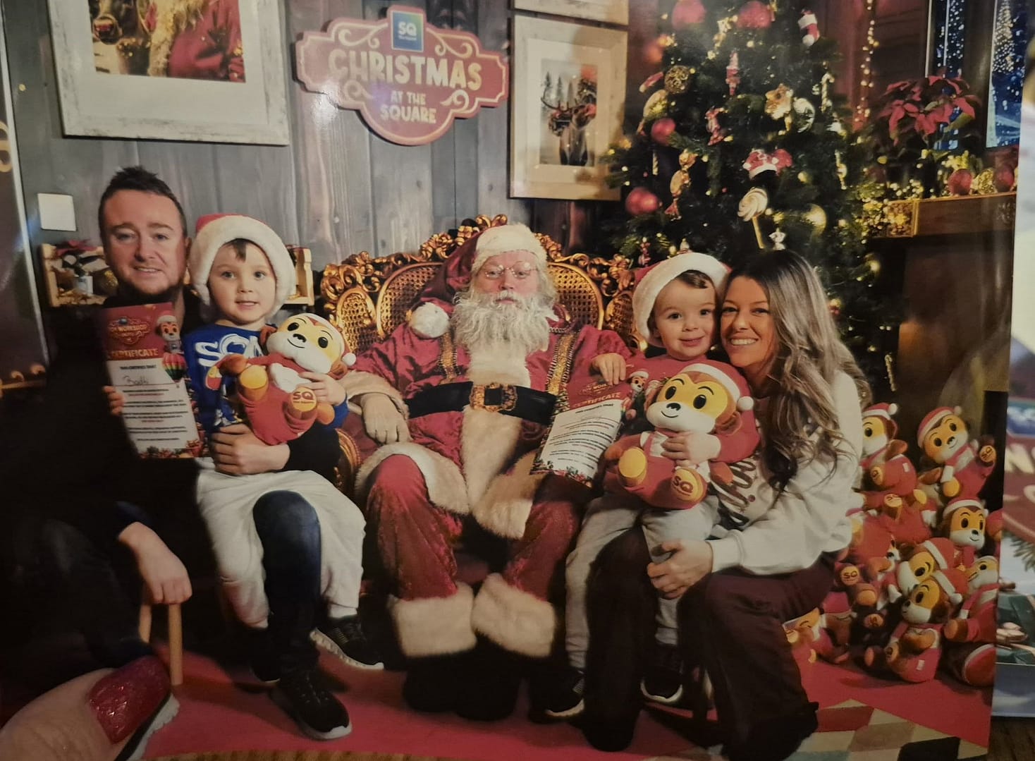 family-santa-gifts family christmas image with santa and gifts